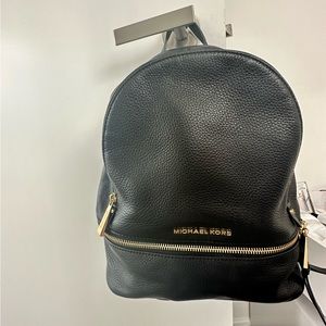 Authentic black Michael Kors Small Backpack